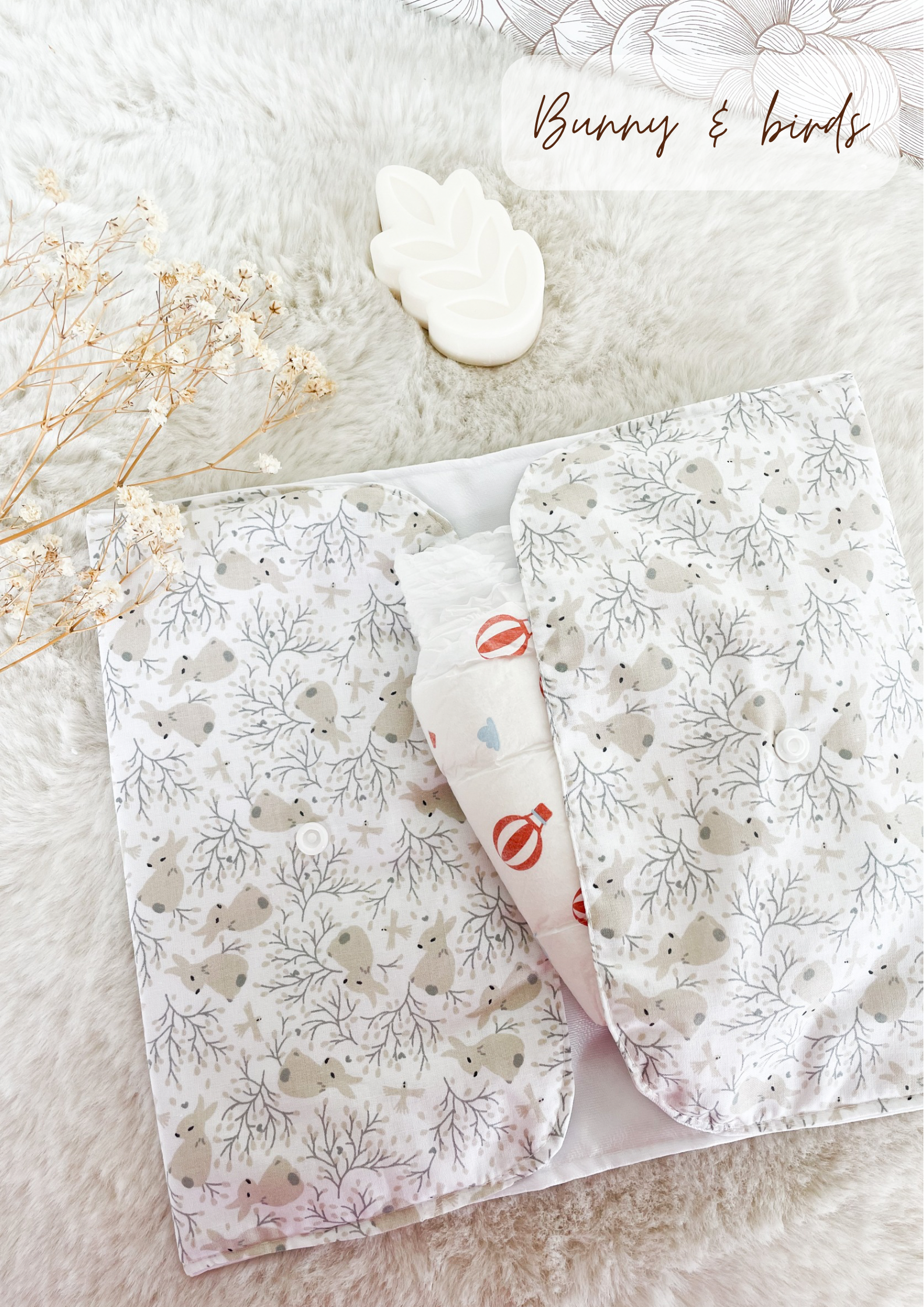 Pochette à couches et lingettes nomade