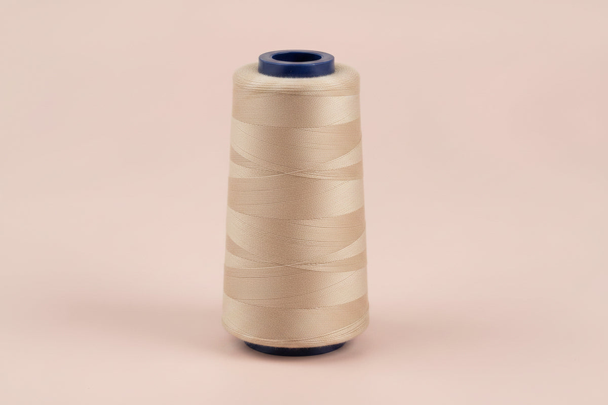 Cône fil à coudre beige