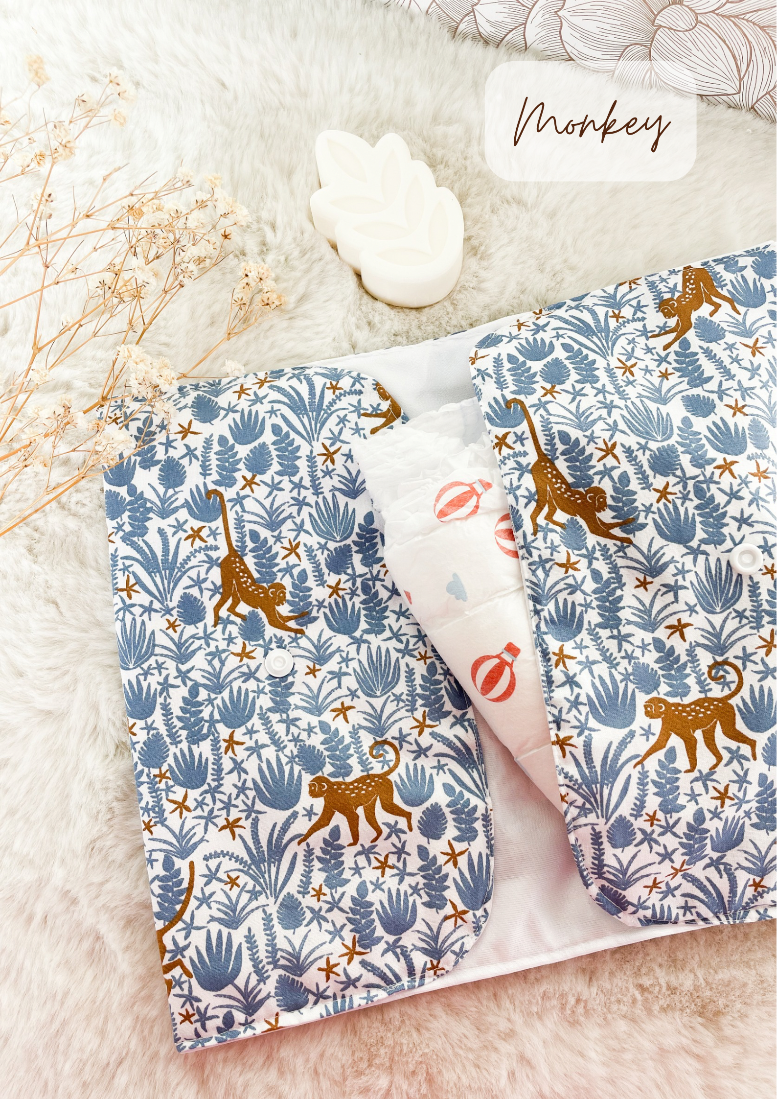 Pochette à couches et lingettes nomade