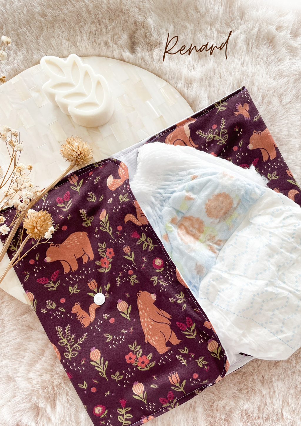 Pochette à couches et lingettes nomade