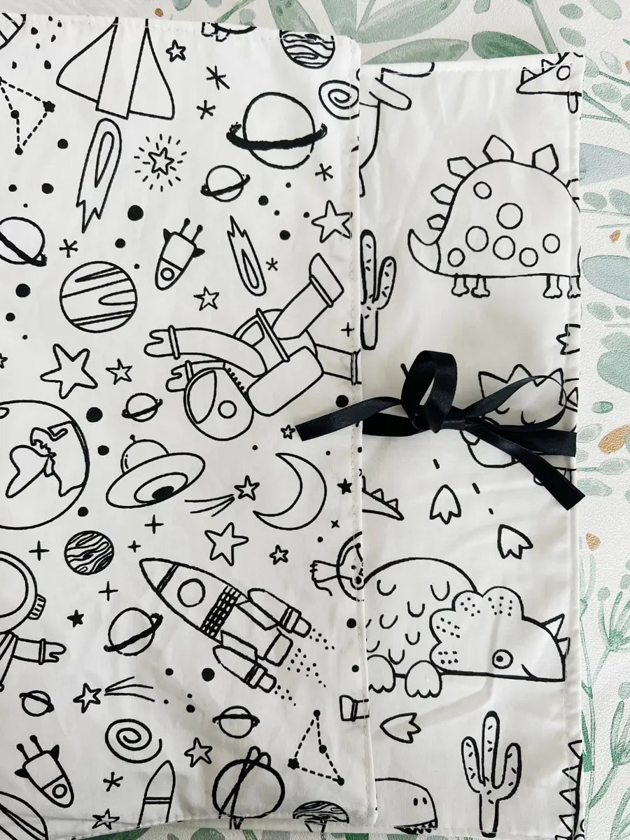 Set de table à colorier lavable (et ses feutres) - Astronautes et dinosaures
